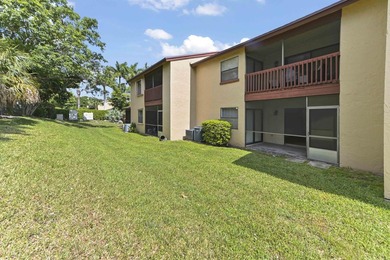 Welcome to this charming two-bedroom, two-bathroom condominium - photo 22
