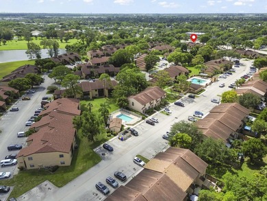 Welcome to this charming two-bedroom, two-bathroom condominium - photo 25