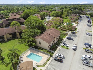 Welcome to this charming two-bedroom, two-bathroom condominium - photo 26