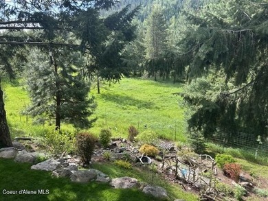 Custom-built home on 13.59 private, treed acres in the highly - photo 14