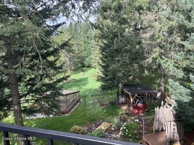 Custom-built home on 13.59 private, treed acres in the highly - photo 15