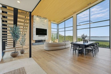 Elegance. Raffinement. Acces direct au lac. Cette residence - photo 5