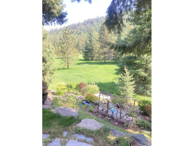 Custom-built home on 13.59 private, treed acres in the highly - photo 19