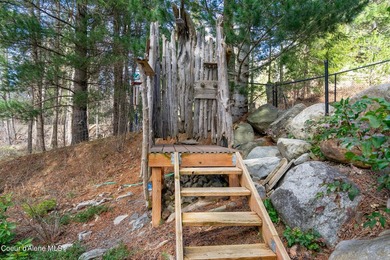 Custom-built home on 13.59 private, treed acres in the highly - photo 25
