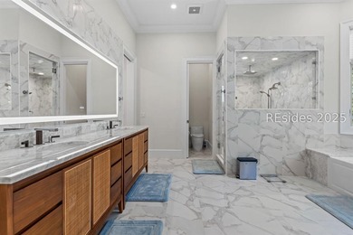 Experience luxury living at its finest in this beautifully