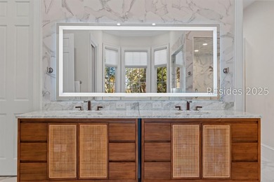 Experience luxury living at its finest in this beautifully