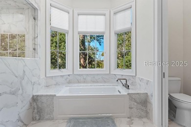 Experience luxury living at its finest in this beautifully