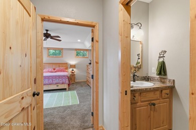 Custom-built home on 13.59 private, treed acres in the highly - photo 39
