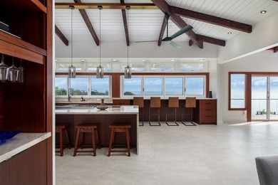 A newly reimagined oceanfront masterpiece perched above the - photo 7