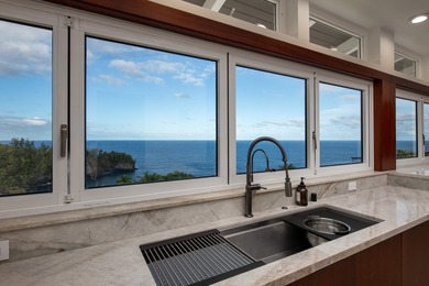 A newly reimagined oceanfront masterpiece perched above the - photo 9