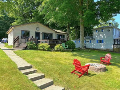 A LITTLE SLICE OF LAKE LIFE PARADISE! Here's a place with the - Lake Home For Sale in Monon, Indiana