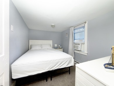 Adorable first-floor 2 bedroom, 1 bath condo located in the