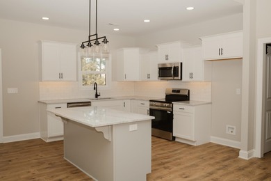 This stunning modern farmhouse offers approximately 1,790 sq. ft