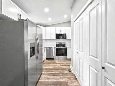 This beautifully updated split-level home offers 3 bedrooms and - photo 11