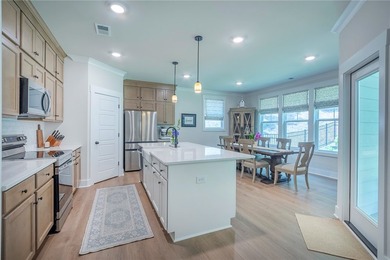 Come home to 1111 Bay Drive in Treasure Bay, a like-new 2023 - photo 12