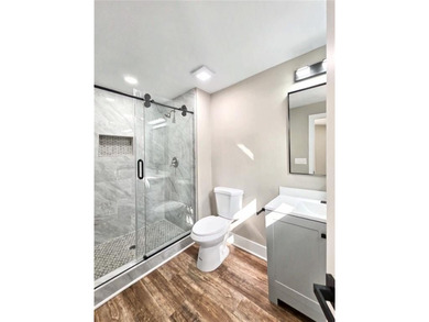 This beautifully updated split-level home offers 3 bedrooms and - photo 17