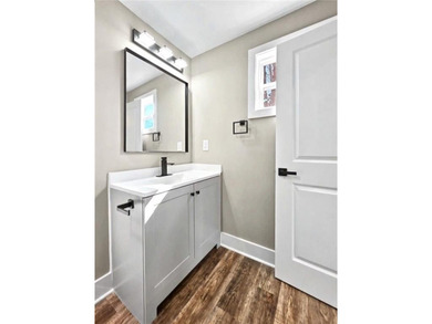 This beautifully updated split-level home offers 3 bedrooms and - photo 18