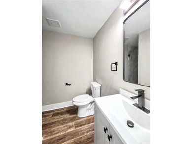 This beautifully updated split-level home offers 3 bedrooms and - photo 23
