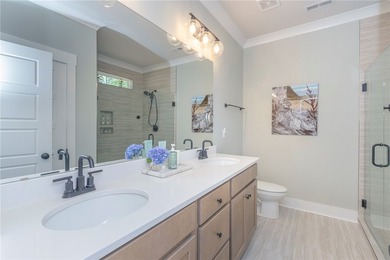 Come home to 1111 Bay Drive in Treasure Bay, a like-new 2023 - photo 25