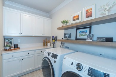 Come home to 1111 Bay Drive in Treasure Bay, a like-new 2023 - photo 32