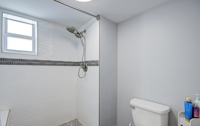 YOU WILL WANT THIS 1ST FLOOR... END UNIT ...WITH IMPACT GLASS - photo 15
