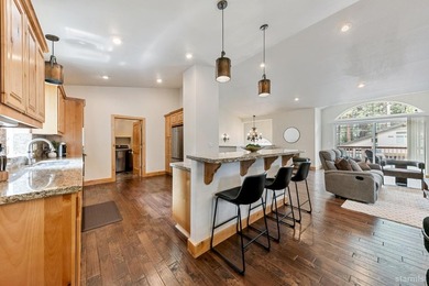 Located in the desirable Tahoe Island Park neighborhood, this - photo 16