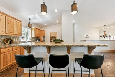Located in the desirable Tahoe Island Park neighborhood, this - photo 17