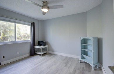 YOU WILL WANT THIS 1ST FLOOR... END UNIT ...WITH IMPACT GLASS - photo 19