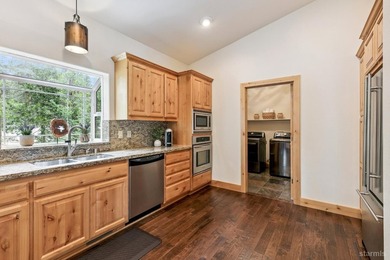 Located in the desirable Tahoe Island Park neighborhood, this - photo 20