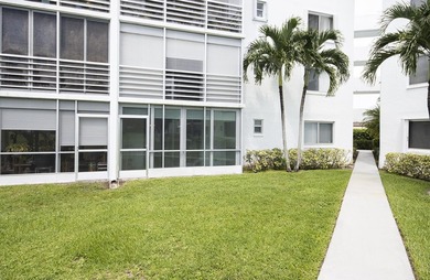 YOU WILL WANT THIS 1ST FLOOR... END UNIT ...WITH IMPACT GLASS - photo 34