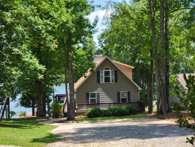 Lake Sinclair home with an expansive view and single boathouse - Lake Home Off Market in Sparta, Georgia