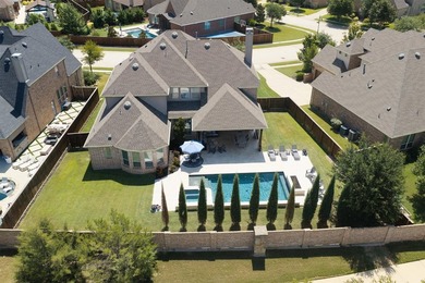 Perched on a beautifully landscaped homesite in Lantana's - photo 1
