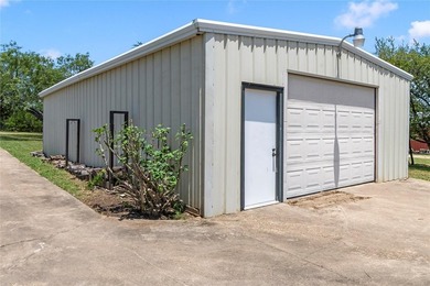 Two residences with a 480 sq ft metal shop on approximately 2.27 - photo 30