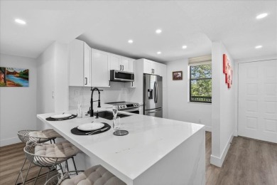 Lake Condo For Sale in Coconut Creek, Florida