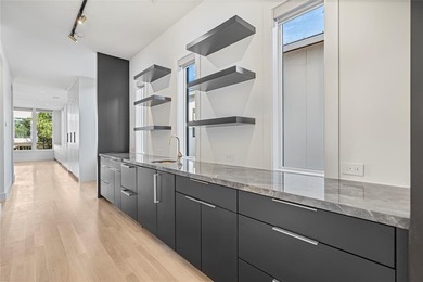 Discover an exquisite three-story modern home in Northern Hills