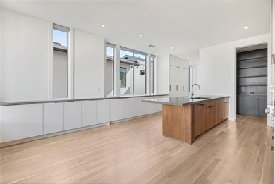 Discover an exquisite three-story modern home in Northern Hills