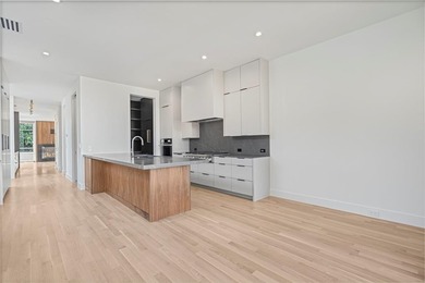 Discover an exquisite three-story modern home in Northern Hills