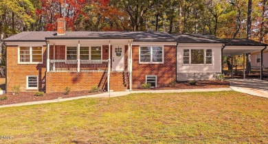 This beautifully remodeled ranch home sits within the