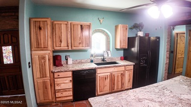 Western Charmer!!! This unique property has 3 houses on 5.56