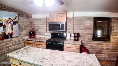 Western Charmer!!! This unique property has 3 houses on 5.56