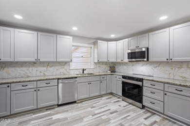 This beautifully remodeled ranch home sits within the