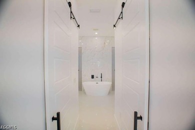 Stunning new construction home on a corner lot with a private - photo 8