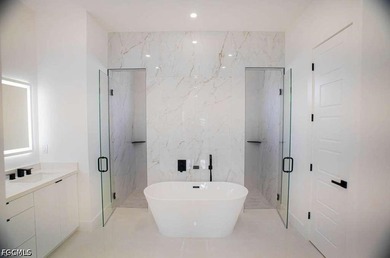 Stunning new construction home on a corner lot with a private - photo 9