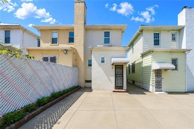 Welcome to this semi-attached two-family home located in the - photo 22