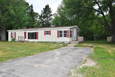 Lake Home For Sale in Houghton Lake, Michigan