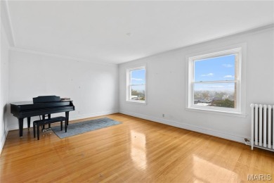 With Forest Park just across the street and views that stretch