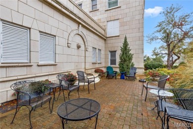 With Forest Park just across the street and views that stretch