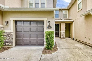 Welcome home to this spacious townhome featuring two upstairs - photo 1