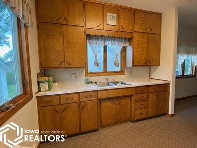 Well Maintained... This two bedroom home with high ceilings &amp;