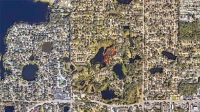 This wonderful pond/lakefront 1.77+- acre site is zoned RSC-4 - photo 2